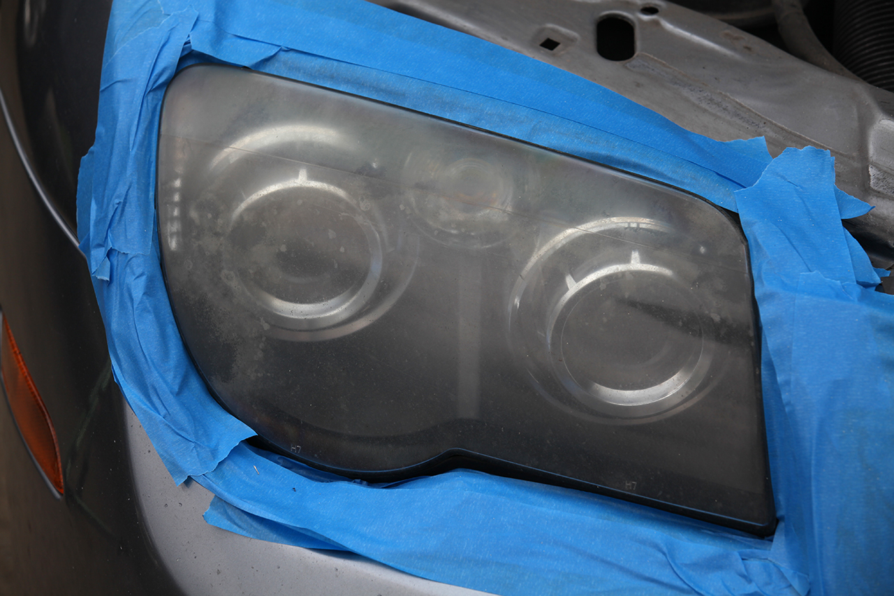 2004 Chrysler Crossfire headlight lens before treatment