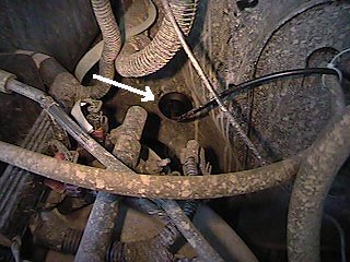 View of CB cable passing into engine compartment through cowl