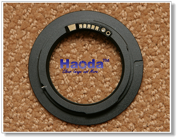 Haoda M-42 to Canon EOS electronic mount adapter with autofocus confirmation.