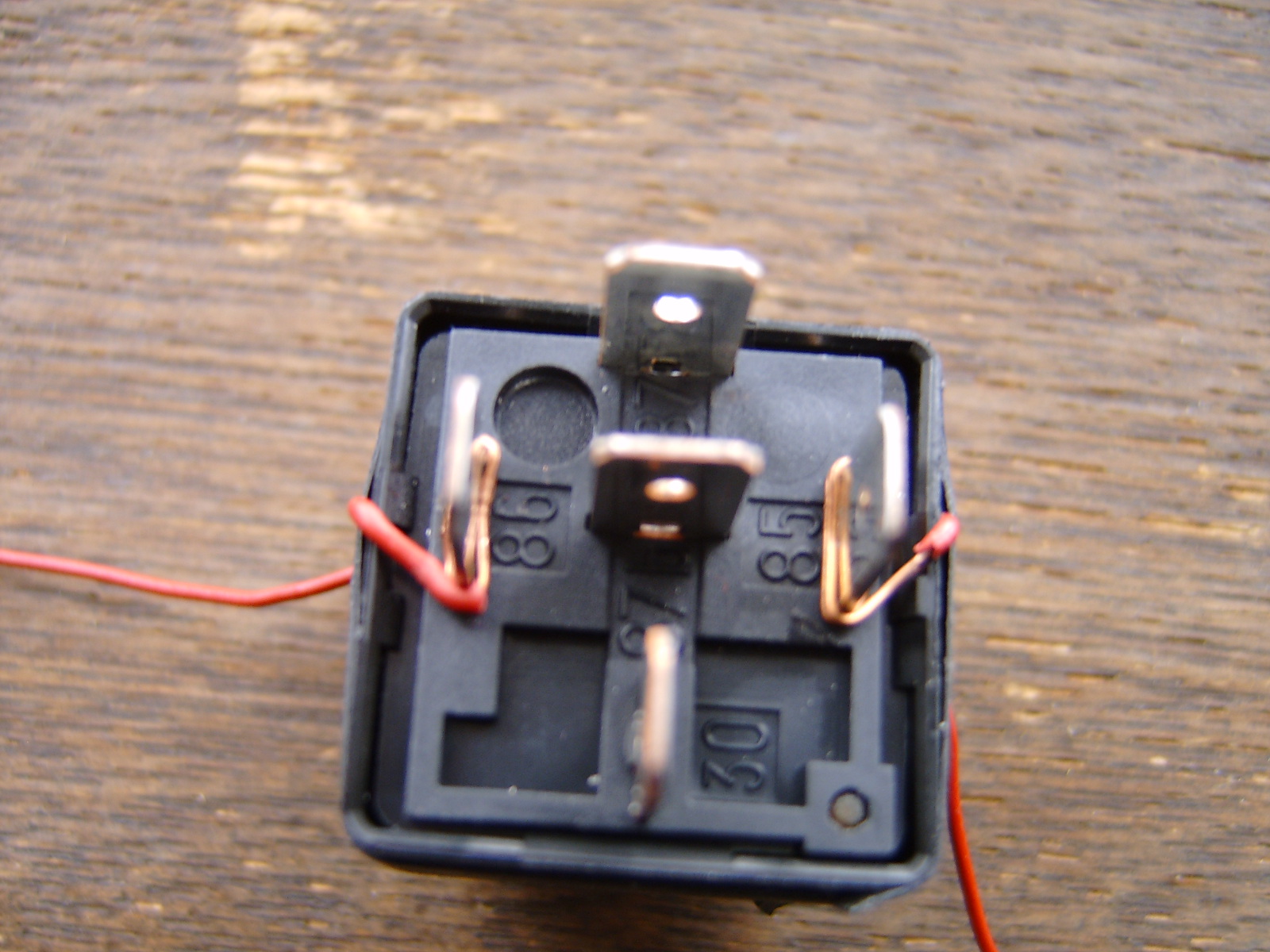 Relay with Wires wrapped around terminal 86 (negative) and 85 (positive)