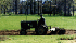 Hugh Webb plowing garden
