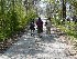 Tom, Ted and Maria walking from parking