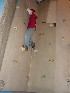 Tom climbs the wall