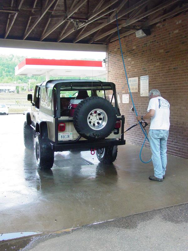 Robert washing off the sink hole