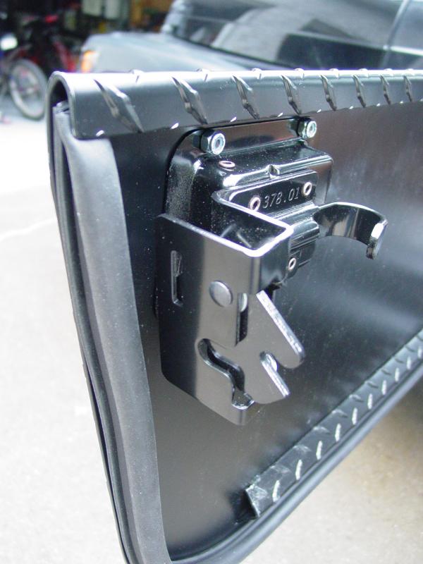 View of inside of door with latch and weather stripping - Click to Enlarge