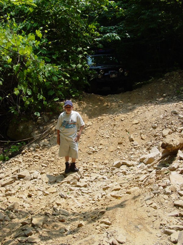 Ted at a large slip in the trail - Click to Enlarge
