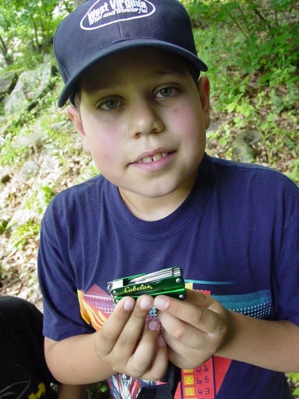 Ted shows the Cabelas Tool - Click to Enlarge