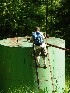 Tom on Tank near Oil Rig