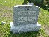 Gravestone near UP,UP,AND AWAY