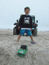 Tom playing in the sand