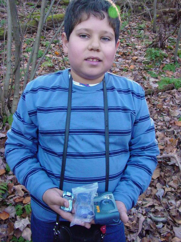 Ted with Cobra that he left, flashlight car that he took and camera ready to be developed - Click to Enlarge