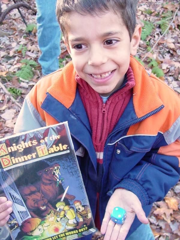 Tom with Dice that he left, Comic book that he took - Click to Enlarge