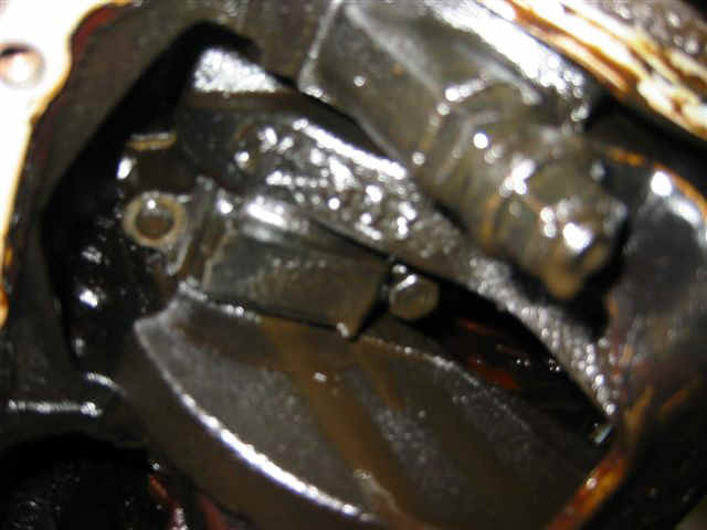 Fuzzy mechanics photo of #6 con-rod cap with missing nut