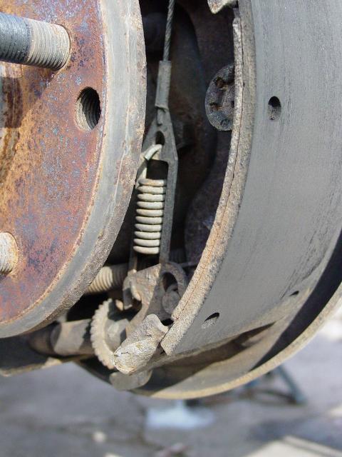 Self-Adjusting spring and tab - Click to Enlarge