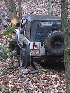 Jim picking rocks out of his rear