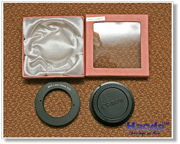 Haoda M-42 to Canon EOS electronic mount adapter with autofocus confirmation.