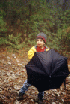 Tommy with an umbrella