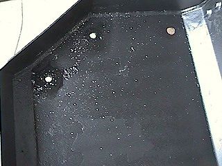 Added holes and Repainted inside of factory Skid Plate