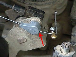 Cable anchor and retaining nut (throttle activated via gas pedal)